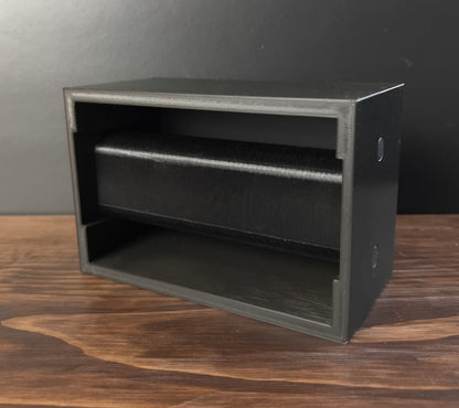 Black Cowan Cases watch, bracelet and necklace case, empty, showing the slide-out bar with a flat side
