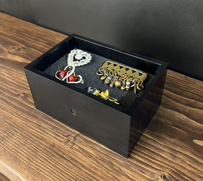 Black Cowan Cases earring, pendant, ring and cufflink case with pre-scored foam bed, holding brooches and pins
