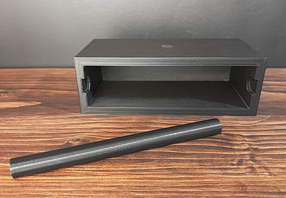 Black Cowan Cases ring case with slide-out ring bar removed, showing the empty case