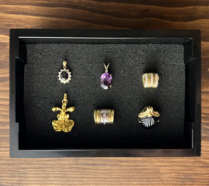 Black Cowan Cases earring, pendant, ring and cufflink case with pre-scored foam bed, holding pendants and cufflinks
